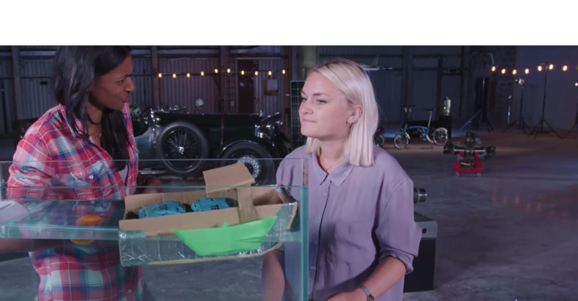 A Dyson engineer builds a cardboard boat.