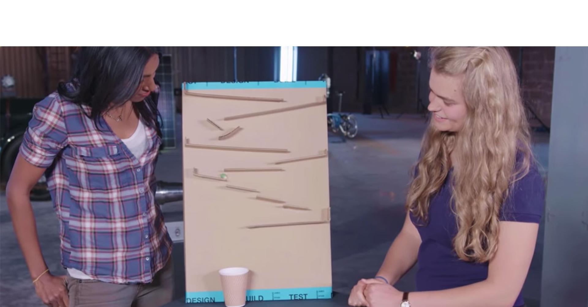 A Dyson engineer shows the “marble minute” challenge.