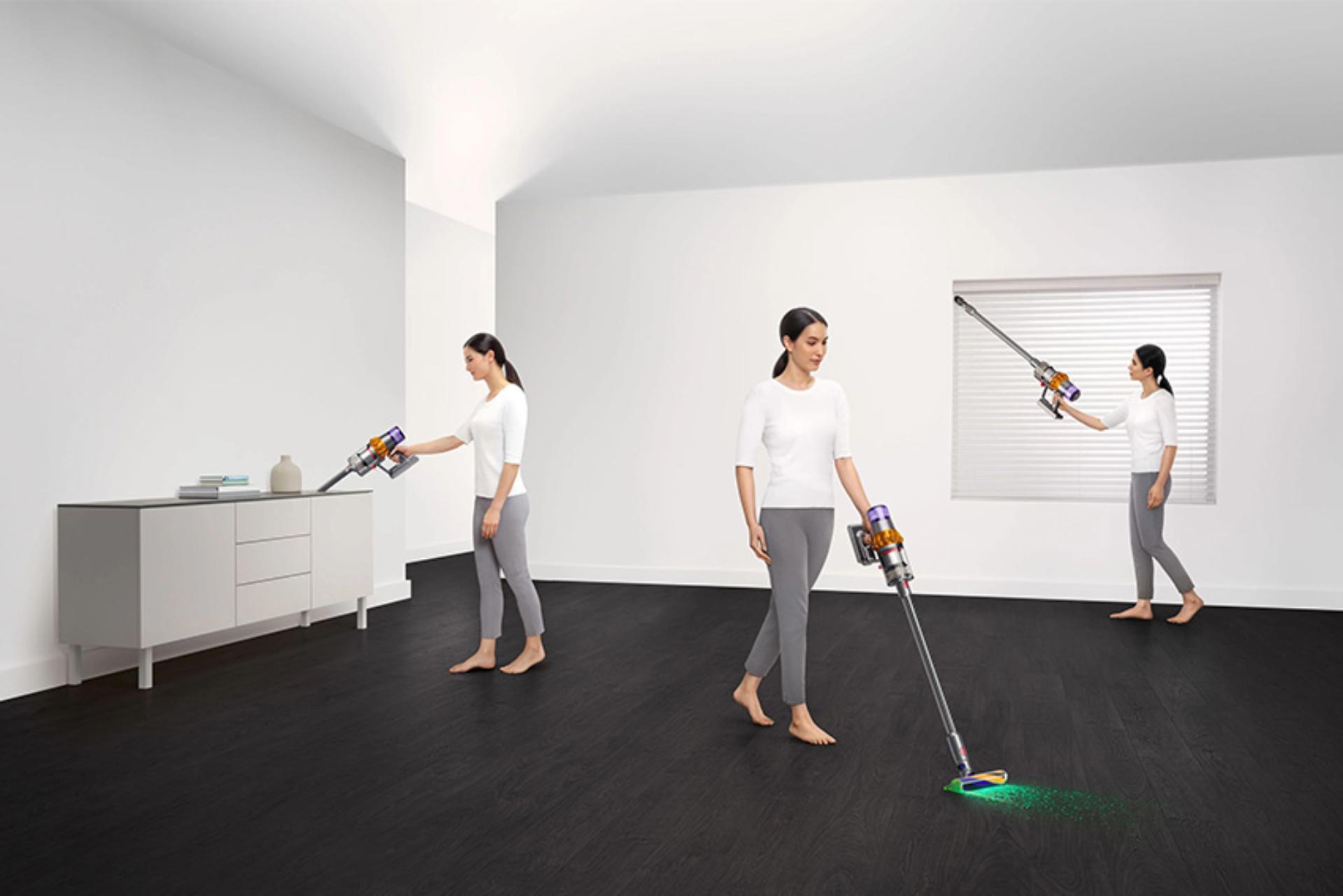 Dyson vacuum being used to clean room