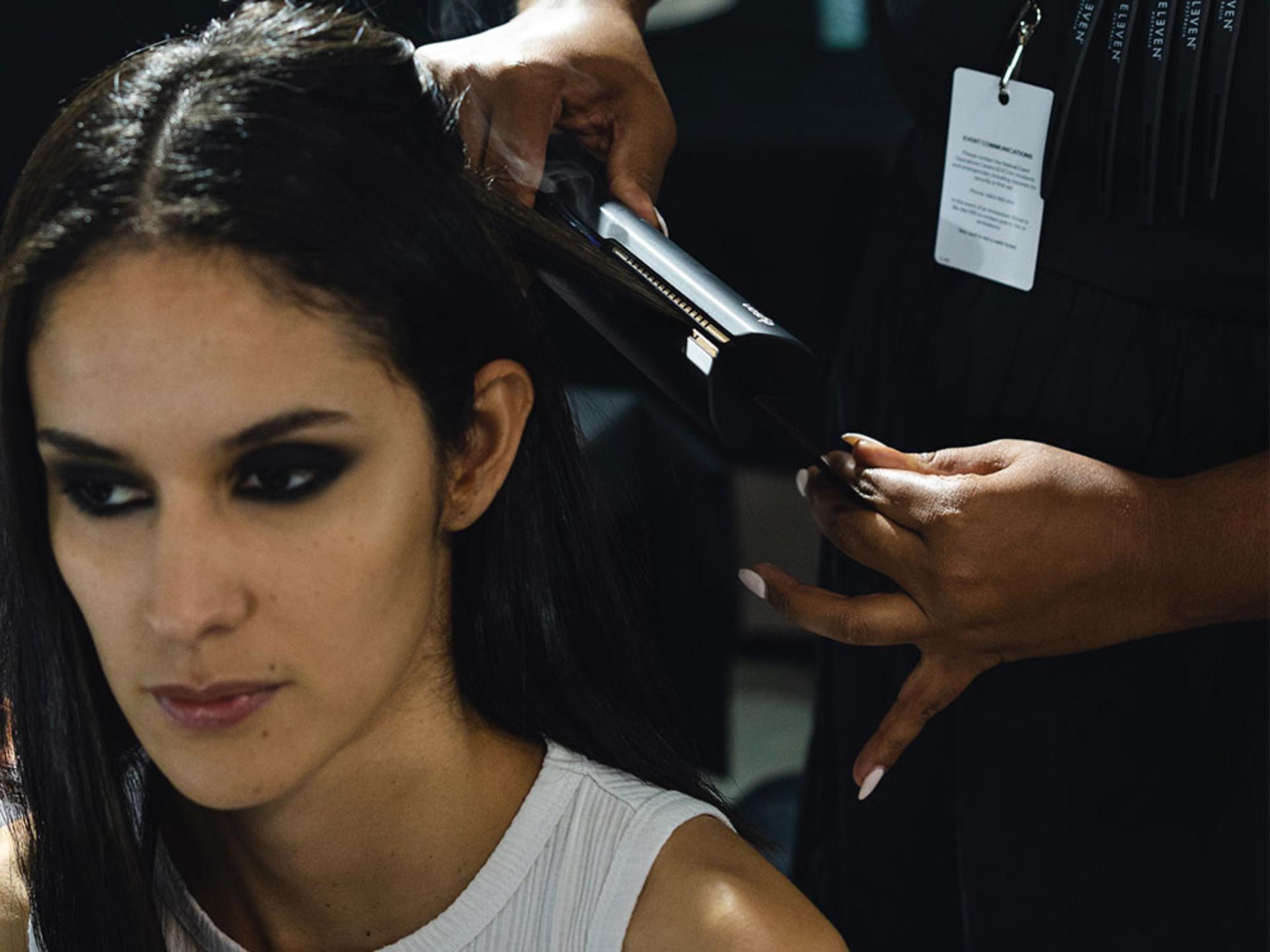 Dyson Corrale being used on models hair