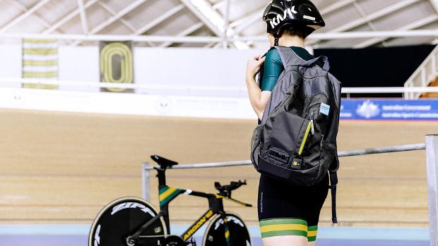 Annette Edmondson in veledrome with Dyson air quality backpack