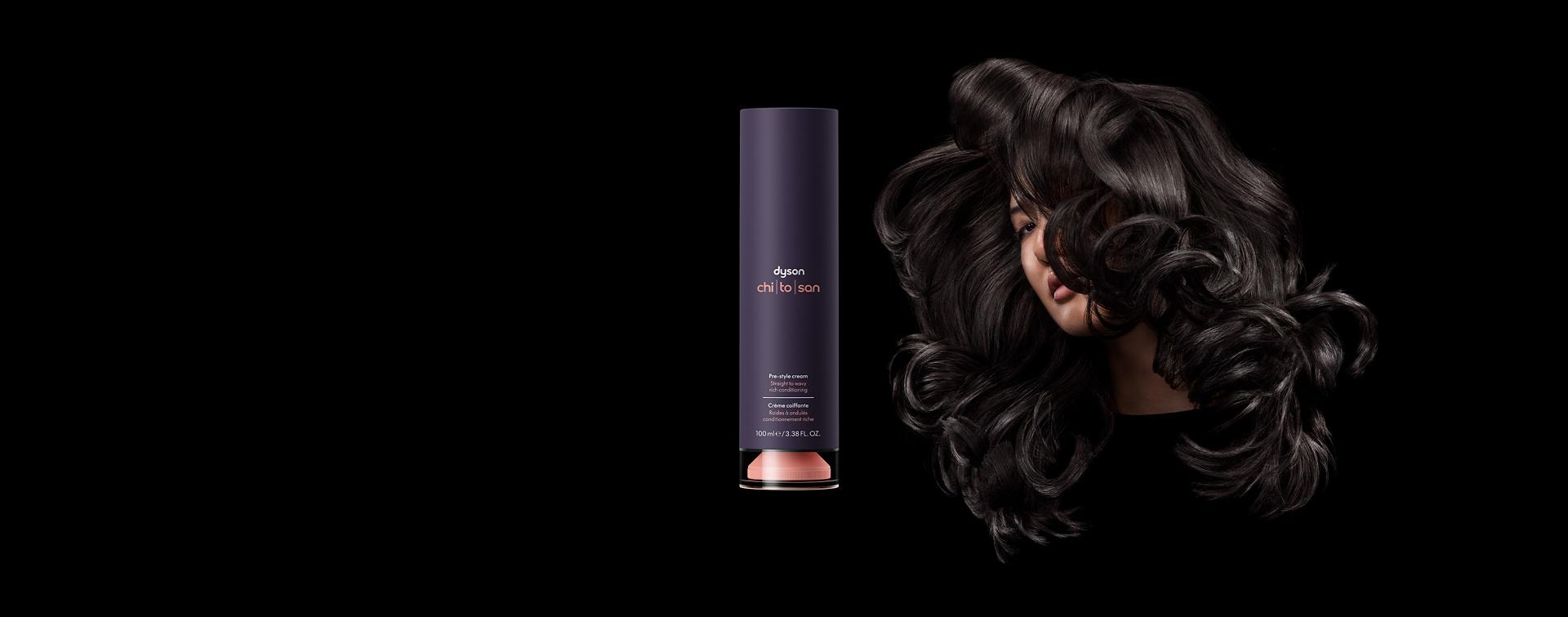 Model next to the Dyson Chitosan Pre-style cream