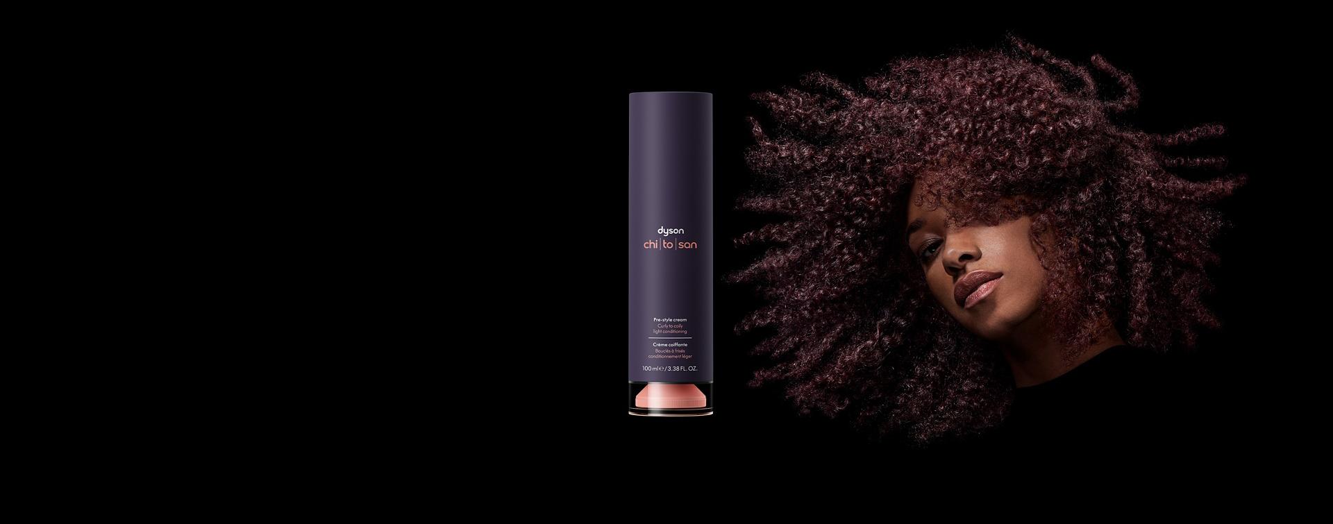 Model next to the Dyson Chitosan Pre-style cream