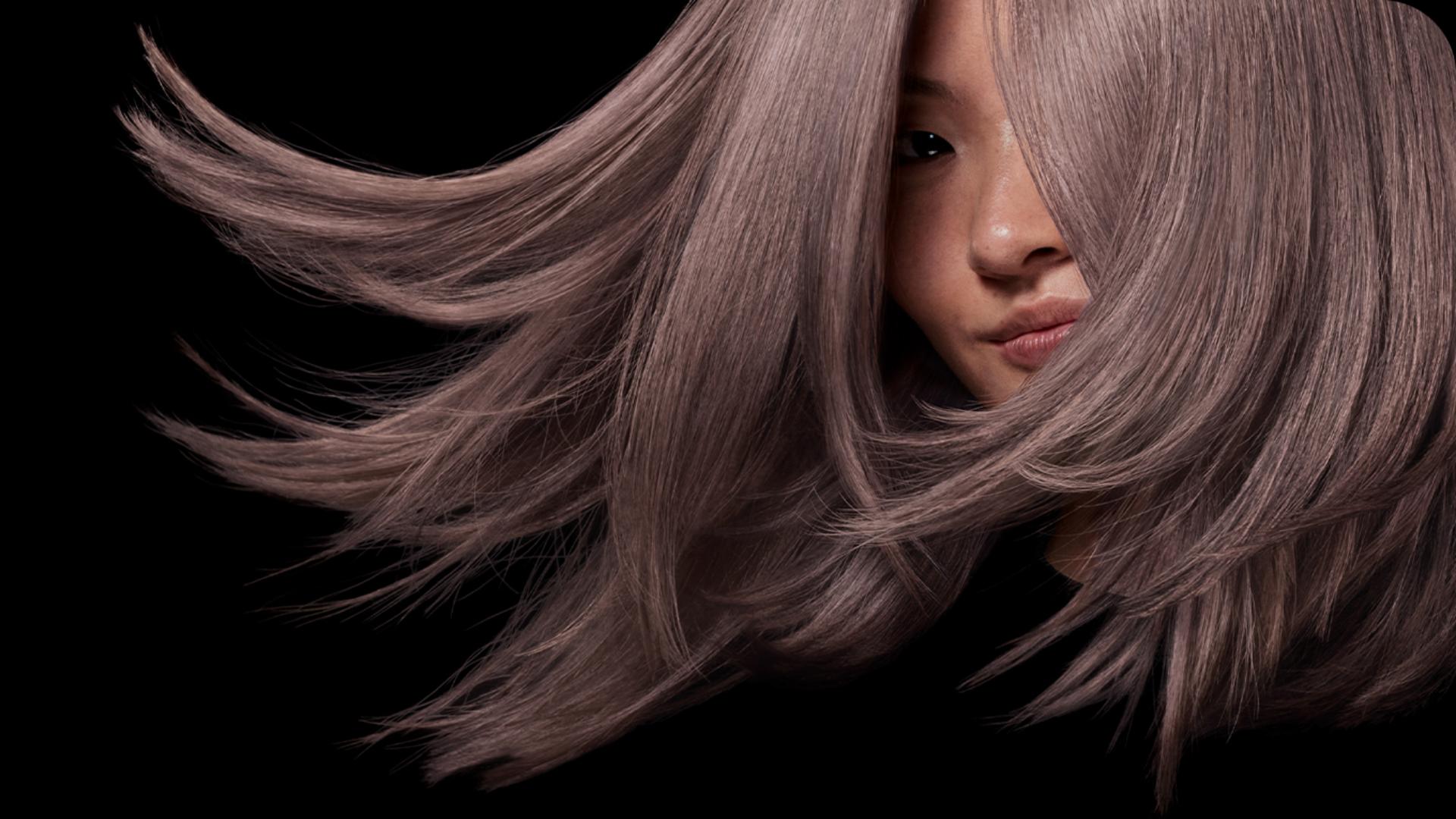 Model with sleek, shiny, styled hair