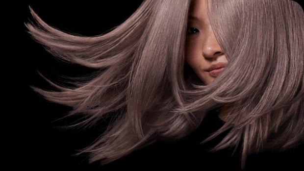 Model with sleek, shiny, styled hair