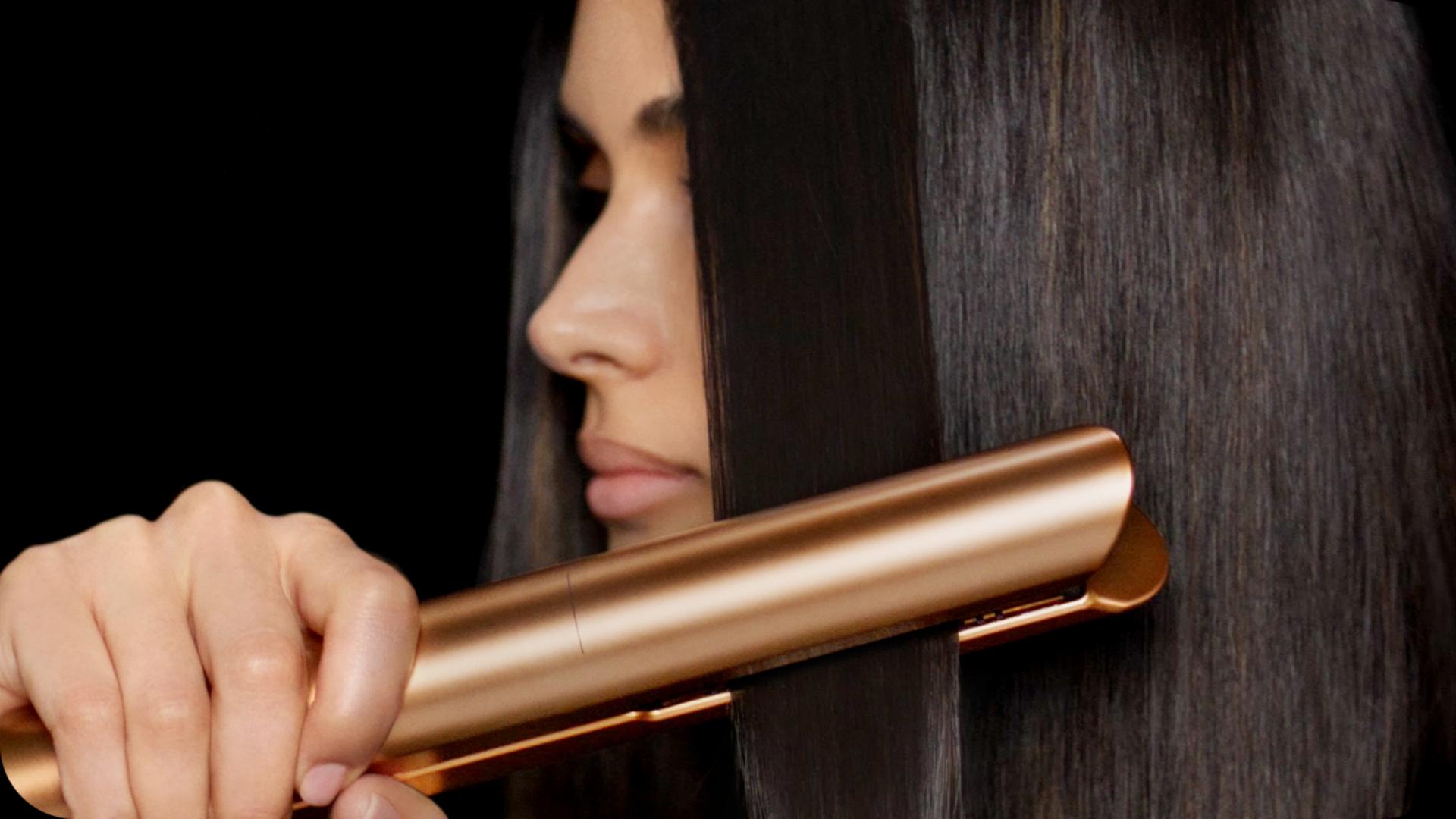 Model with sleek, shiny, styled hair