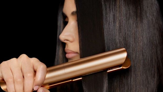 Model with sleek, shiny, styled hair