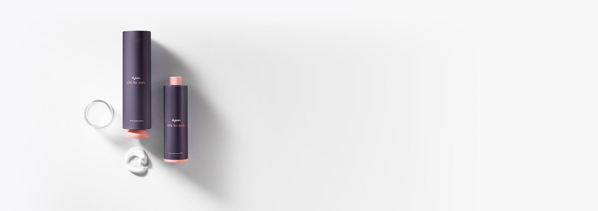 Dyson Chitosan Pre-style cream outer packaging and refill bottles next to each other