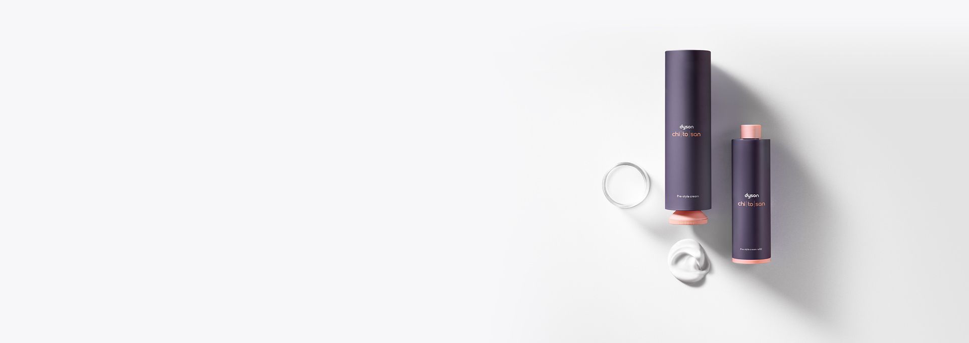 Dyson Chitosan Pre-style cream outer packaging and refill bottles next to each other