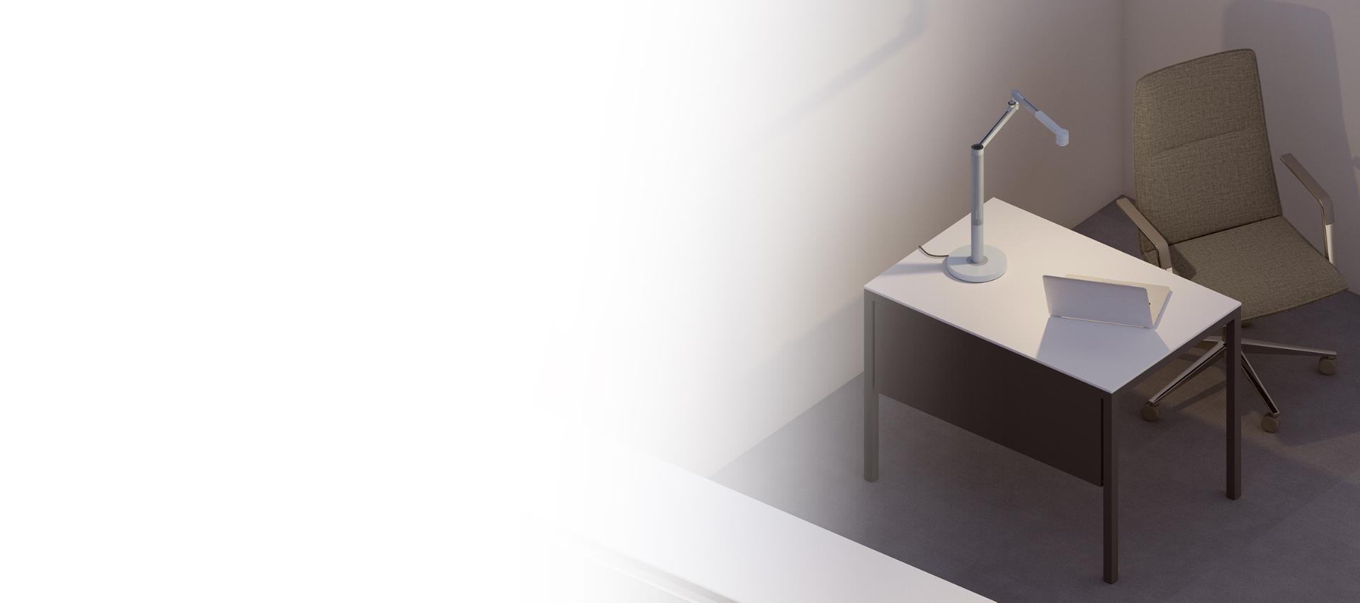 Dyson light sat on desk