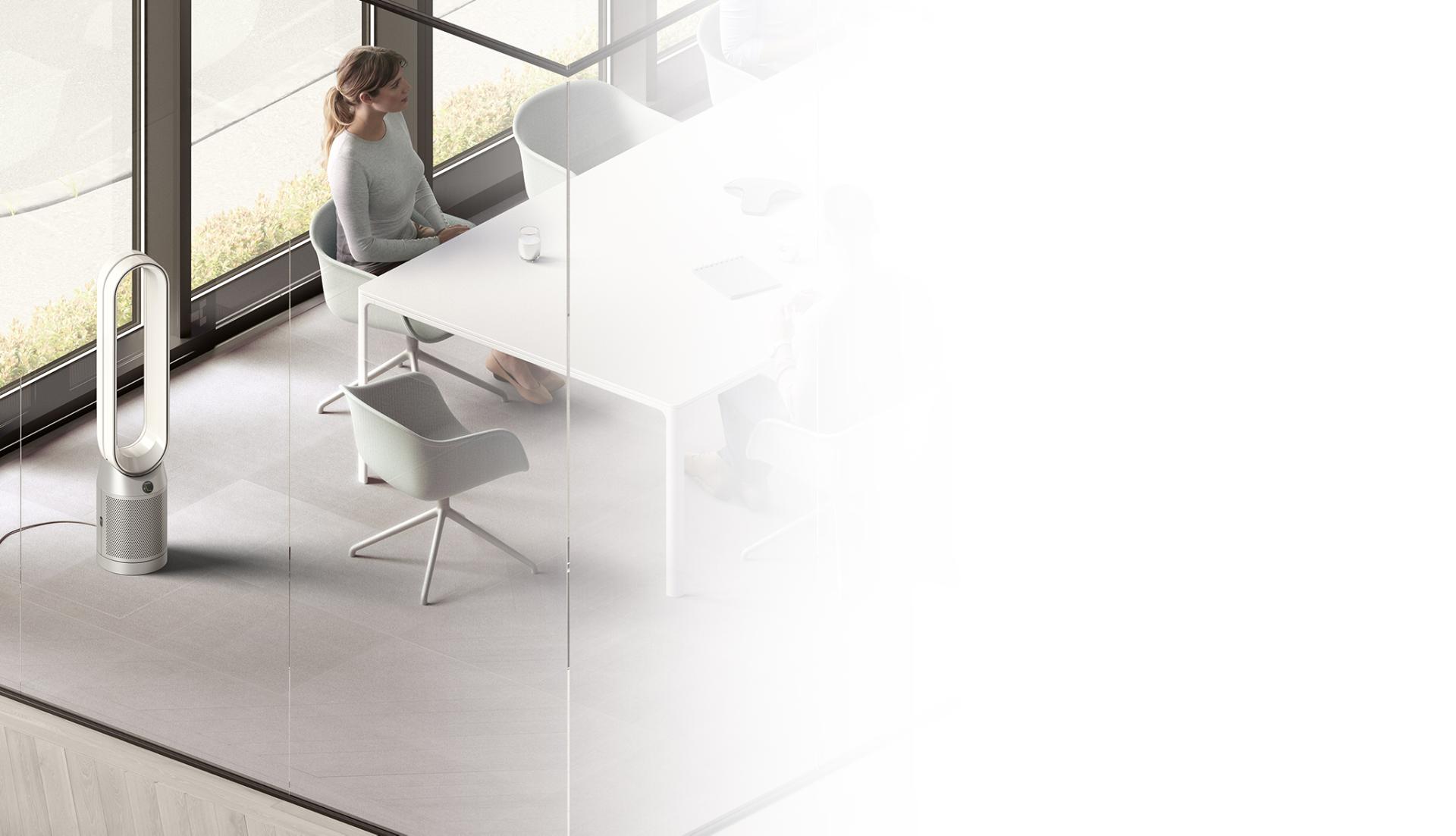 Oczyszczacz Dyson stojący w narożniku biura podczas spotkania