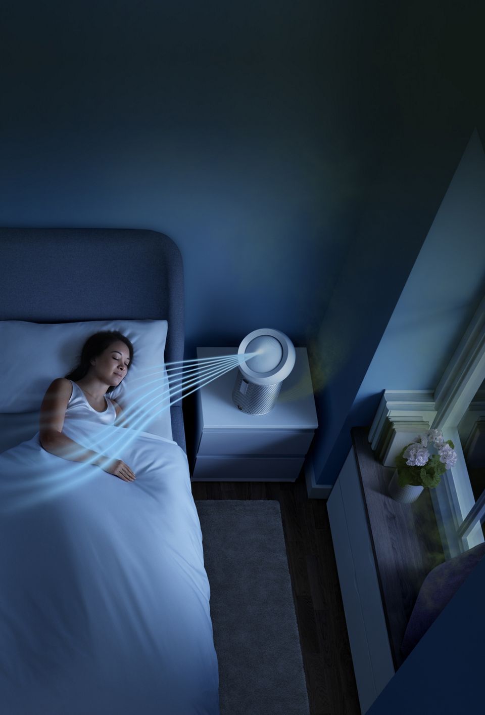 Splitscreen of an uncomfortable woman in bed surrounded by sources of indoor air pollution, and a woman with a Dyson personal purifying fan enjoying a comfortable night's rest