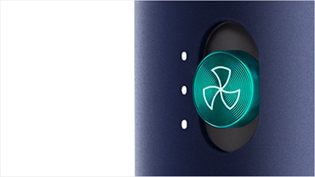 Close-up of airflow button on the Dyson Airwrap.