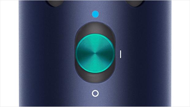 Close-up of cold shot button on Dyson Airwrap.Close-up of cold shot button on Dyson Airwrap.