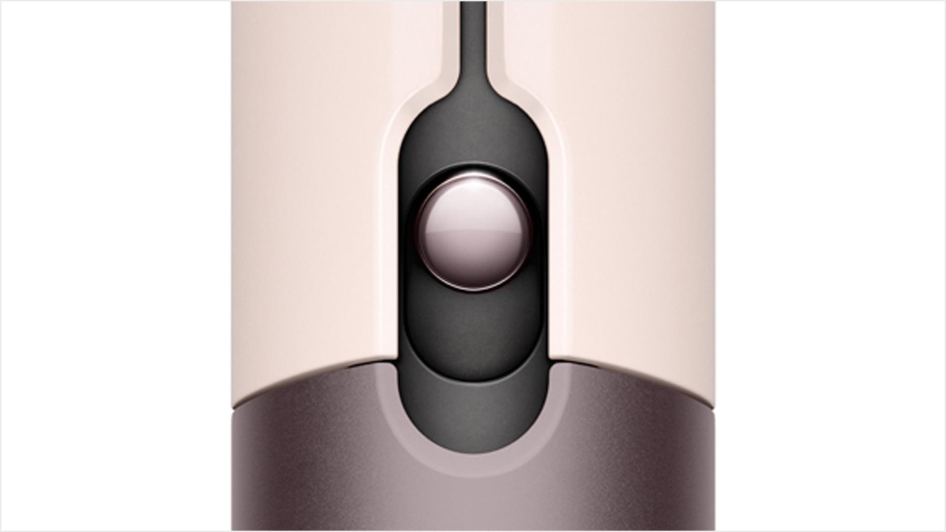 The sliding lock button on the Dyson Airstrait straightener.