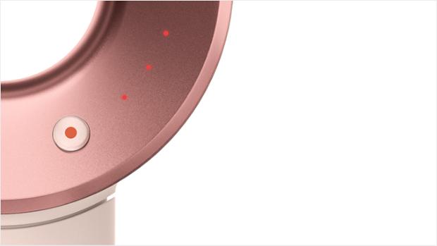 Close-up of the Dyson Supersonic hair dryer's heat settings.