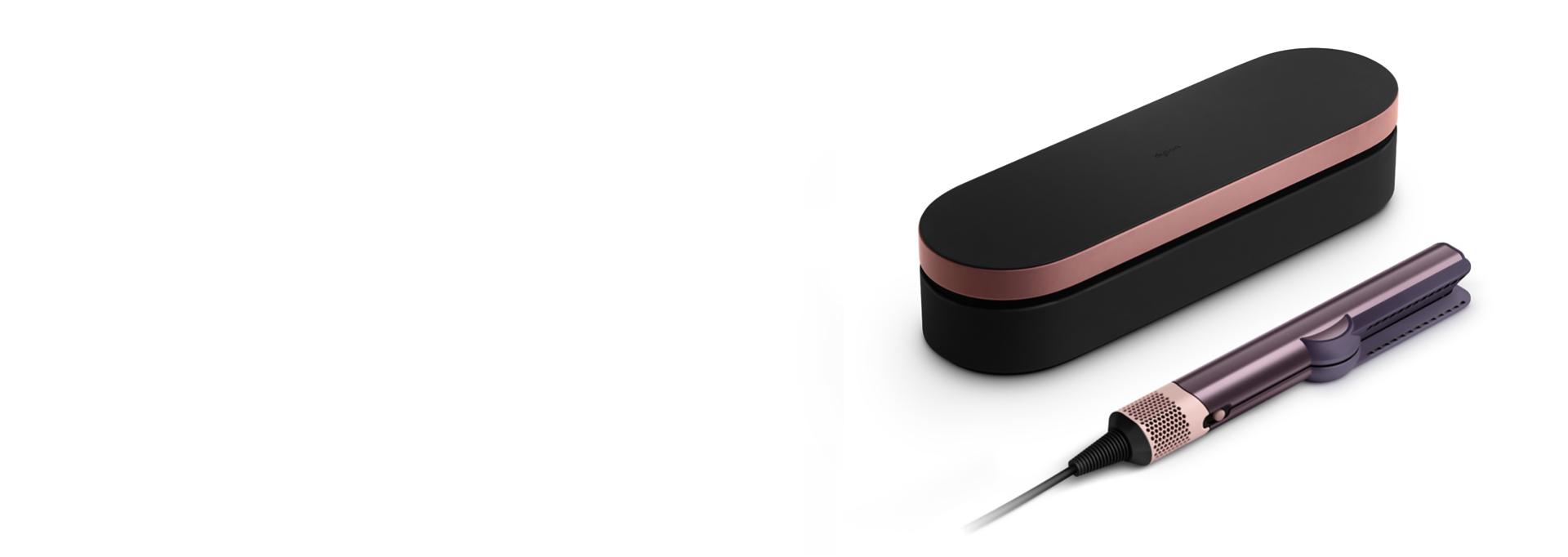 The Dyson Airstrait straightener and Presentation case in the Jasper plum colourway.