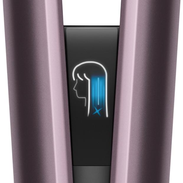 Close-up of the Dyson Airstrait's LCD screen showing the selected settings.