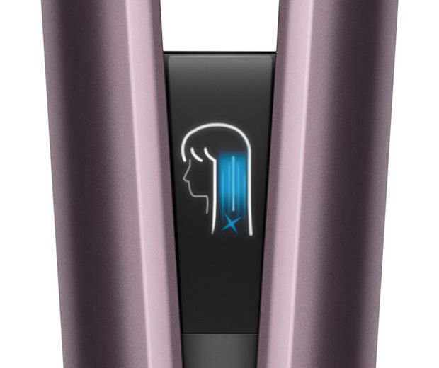 Close-up of the Dyson Airstrait's LCD screen showing the selected settings.