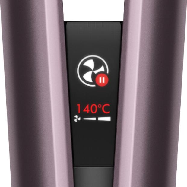 Close-up of the Dyson Airstrait's LCD screen showing the device has automatically paused.