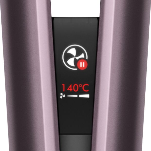 Close-up of the Dyson Airstrait's LCD screen showing the device has automatically paused.