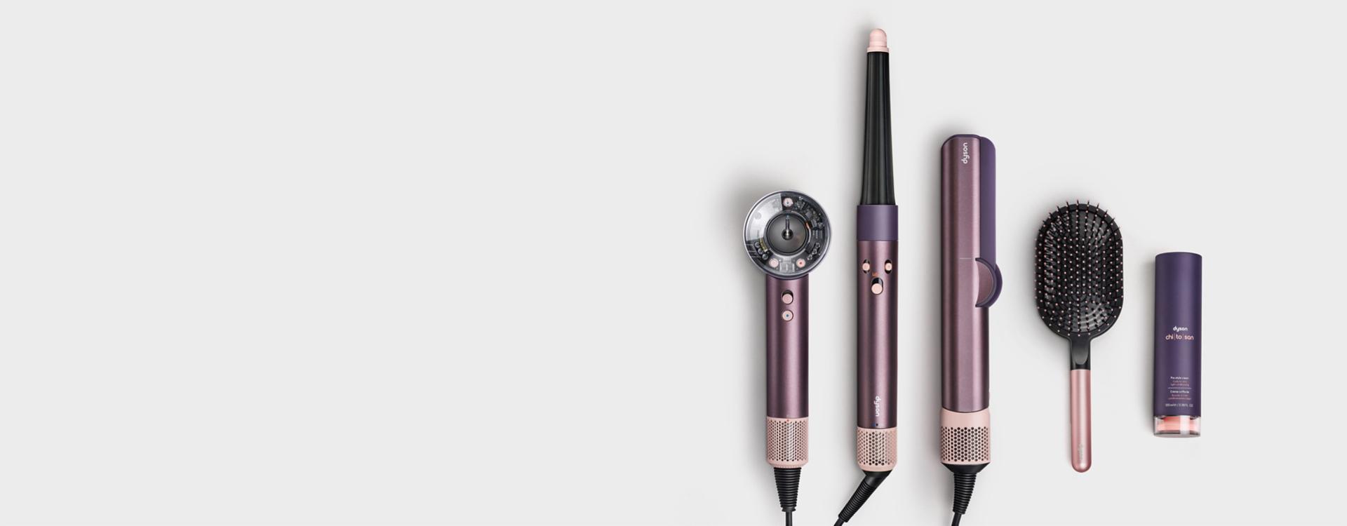 Line up of the Dyson Beauty device range in Jasper plum