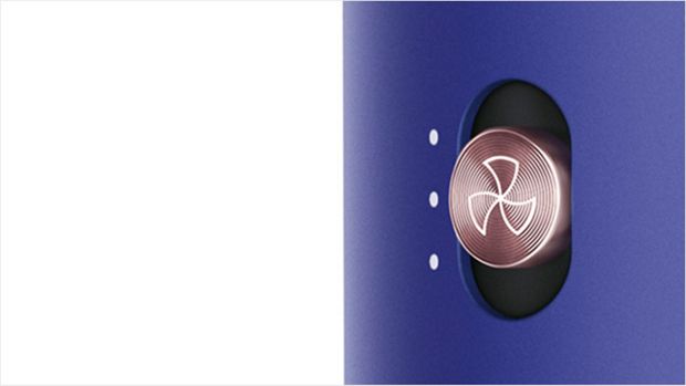 Close-up of airflow button on Dyson Airwrap