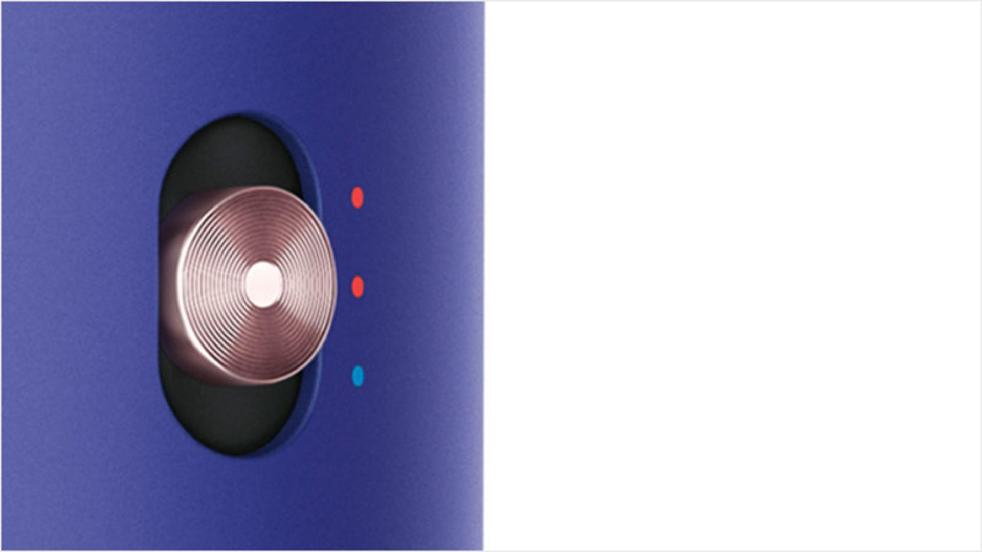 Close-up of heat control button on Dyson Airwrap