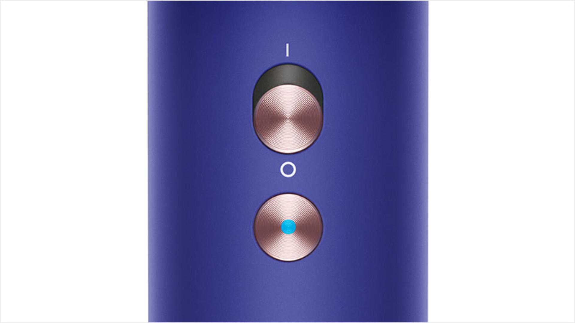 Close-up of the Cold shot button on the Dyson Supersonic.