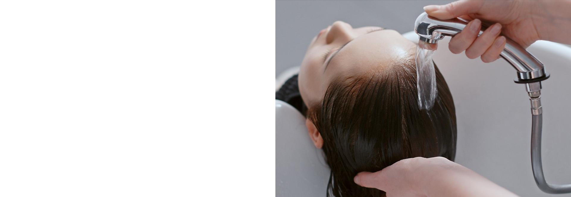 Amy Johnson washing models hair