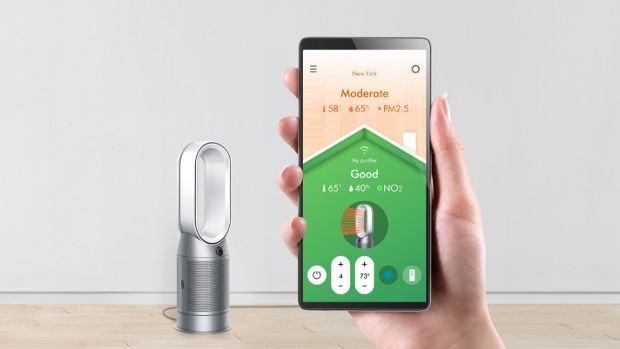 Smartphone controlling a Dyson Purifier Hot+Cool purifying fan heater.
