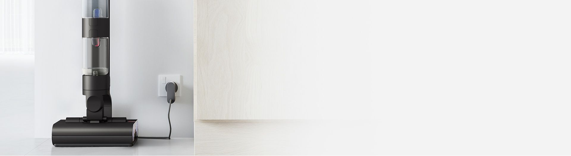 مكنسة Dyson Wash G1 للأرضيات الرطبة في وضعية الشحن.