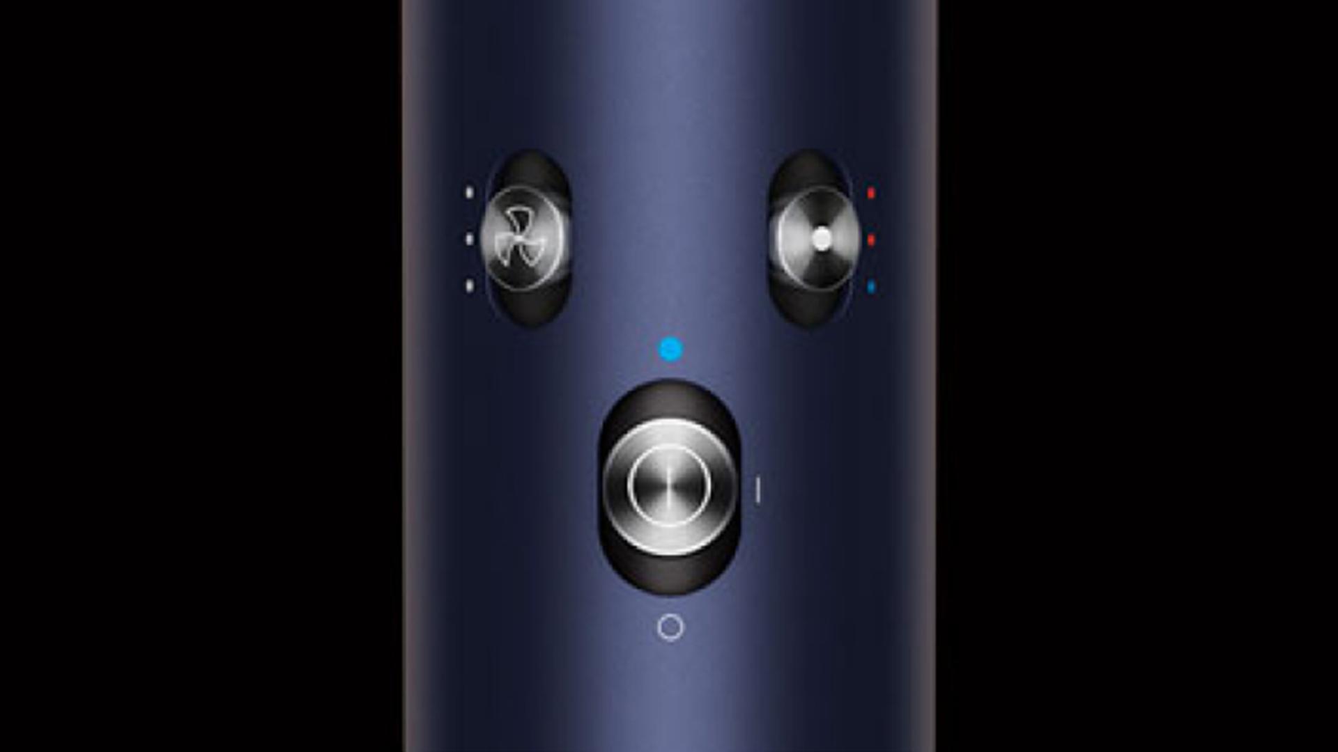 صورة مُقرَّبة لأزرار الإعدادات في مقبض مجفف ومصفف الشعرDyson Airwrap متعدد الوظائف.