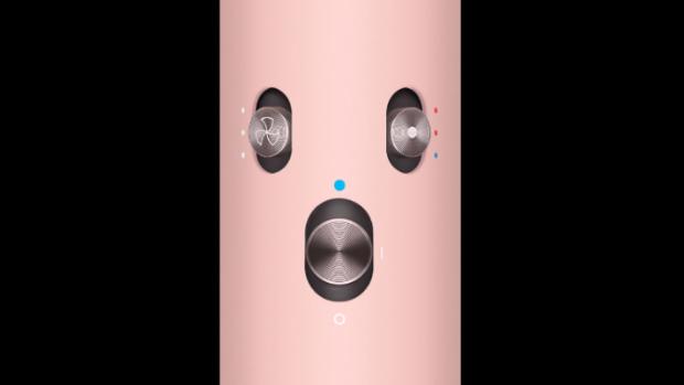 A close-up of the settings buttons on the handle of the Dyson Airwrap multi-styler and dryer.