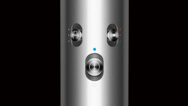  A close-up of the settings buttons on the handle of the Dyson Airwrap multi-styler and dryer.