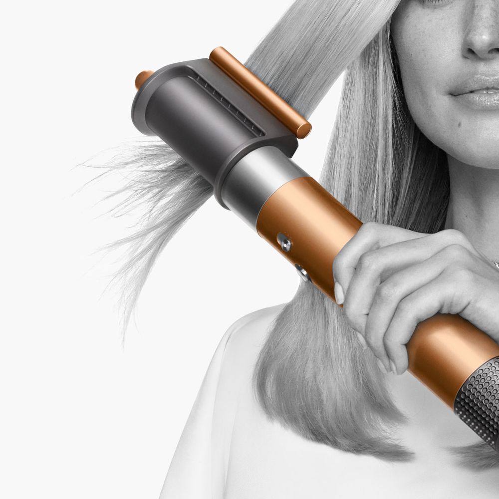 The Dyson Airwrap Multi-styler and dryer with the Coanda smoothing dryer attachment.