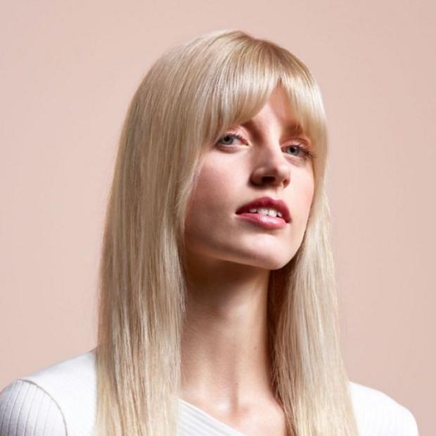 Model with long straight blonde hair.