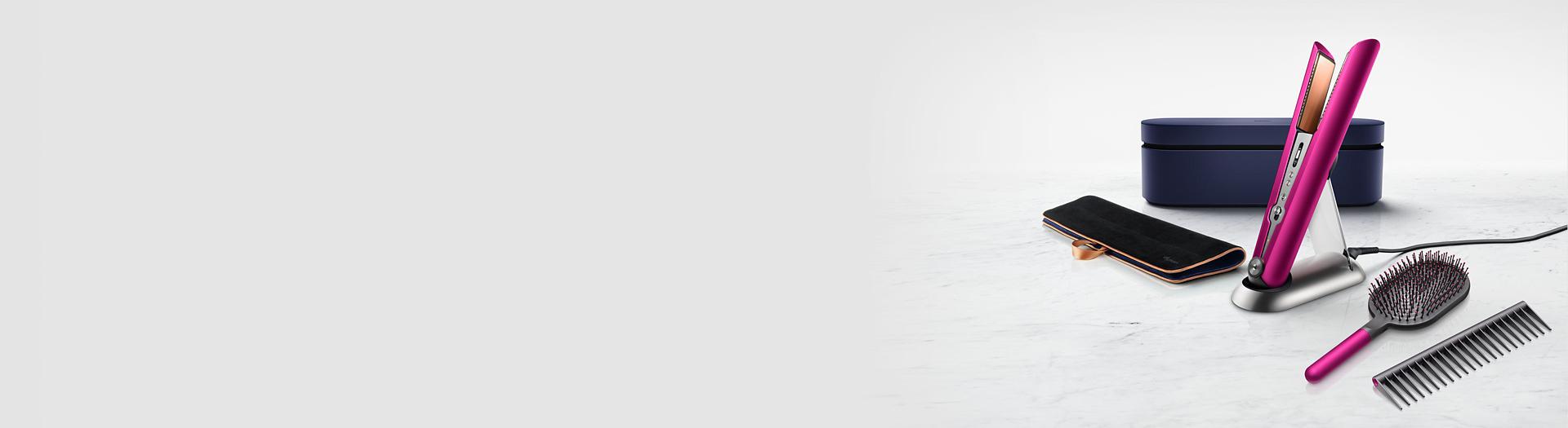 Prostownica do włosów Dyson Corrale z akcesoriami.