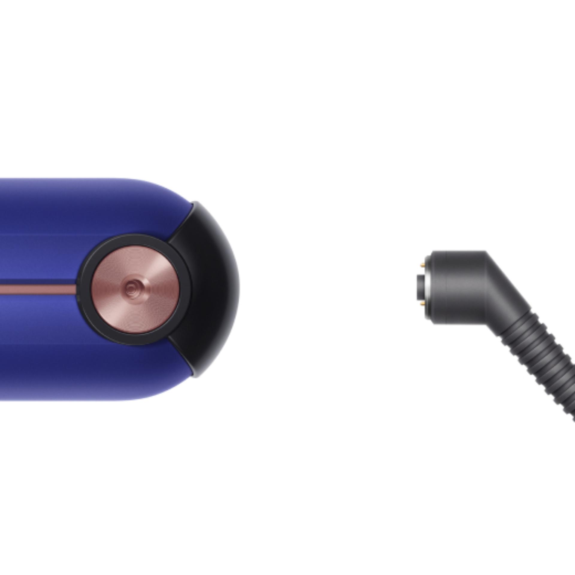 Dyson Corrale straightener with charging cord.