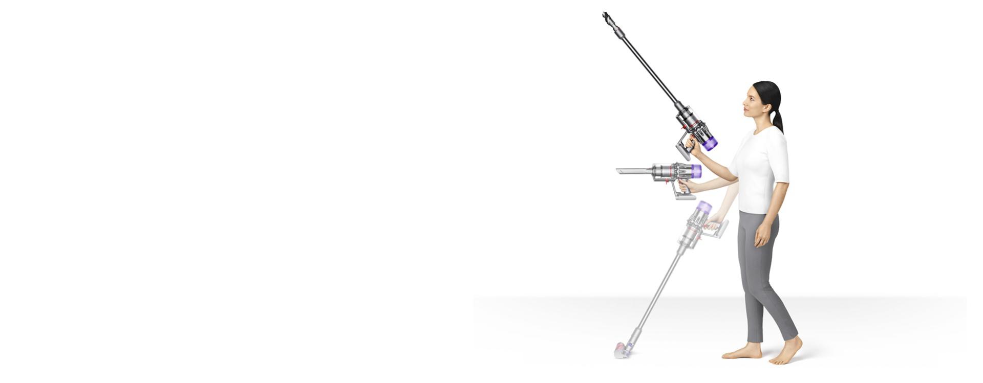 A woman hold the Dyson Digital Slim in various positions to show how light it is.