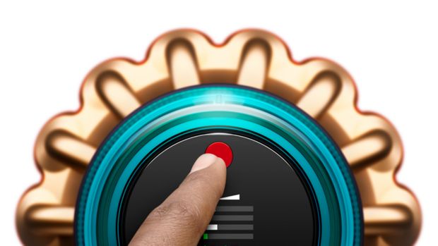 Close-up of the LCD with a finger changing modes.