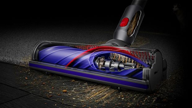 Motorbar cleaner head picking up debris.