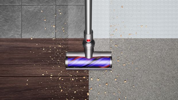The  Dyson V11 Total Clean being used across four different floor types.