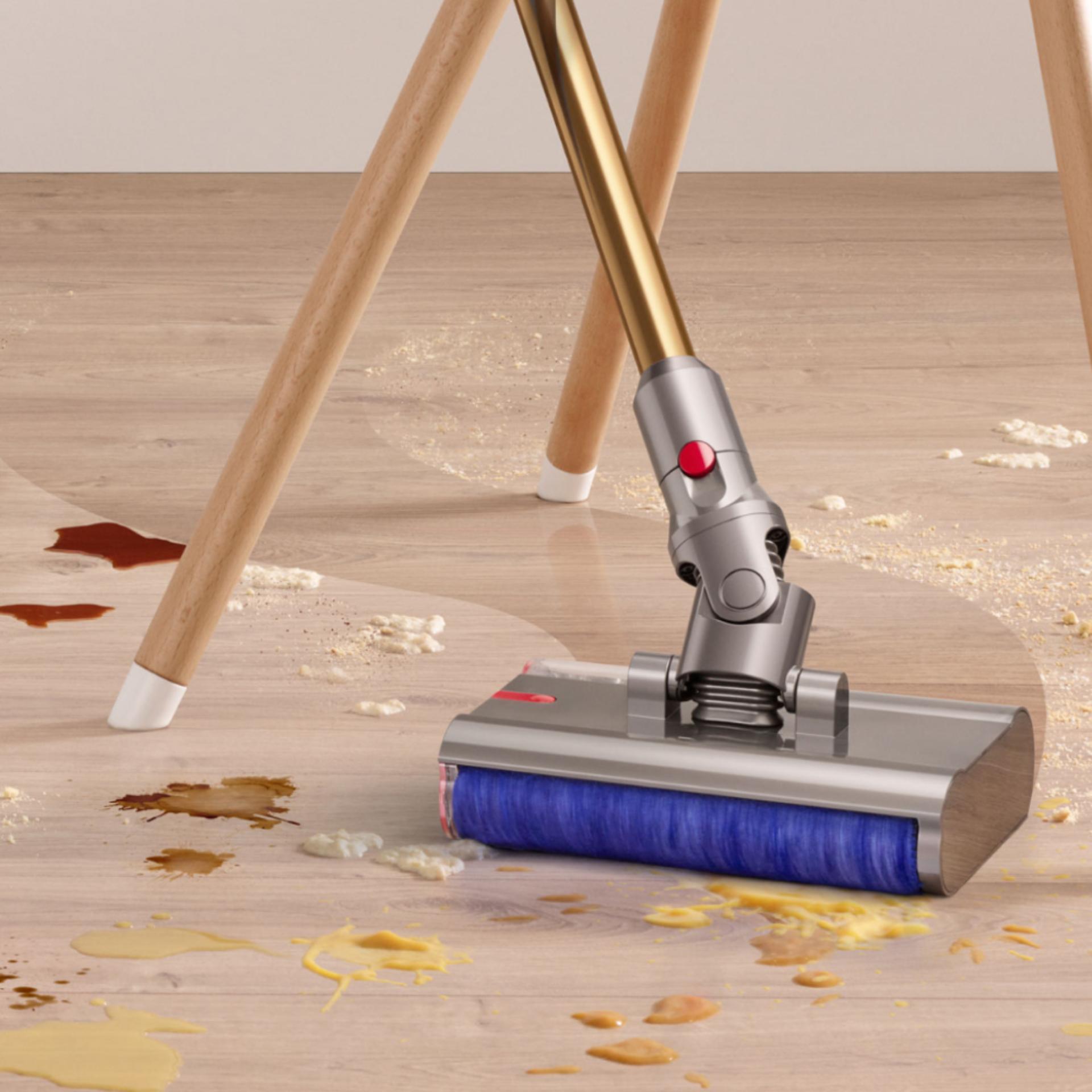 The Dyson V12s Detect Slim Submarine cleans around the legs of a high chair.