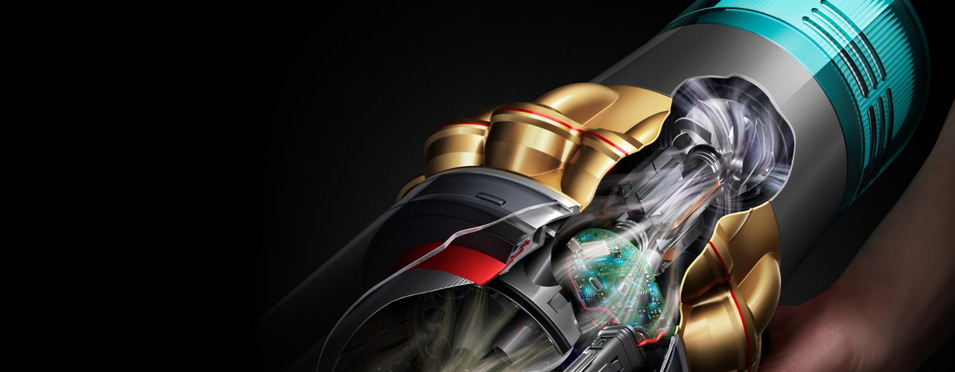 Dyson V15 Detect kablosuz süpürge motorunun ve hava akımı yollarının kesit görünümü.