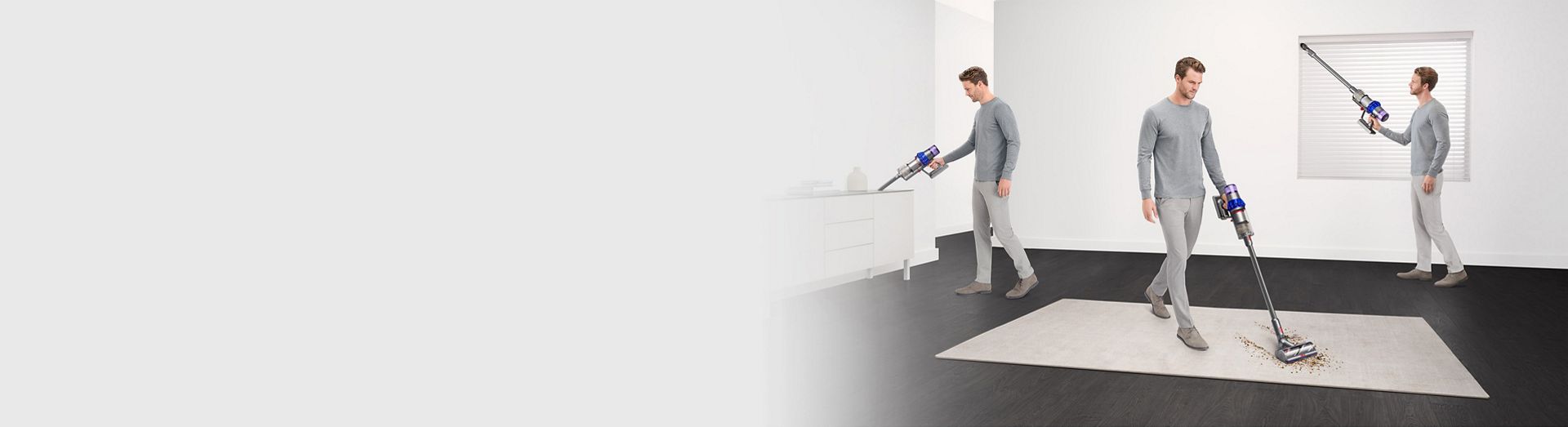 A woman cleaning different parts of a home with the Dyson V15 Detect vacuum and illuminating cleaner head.