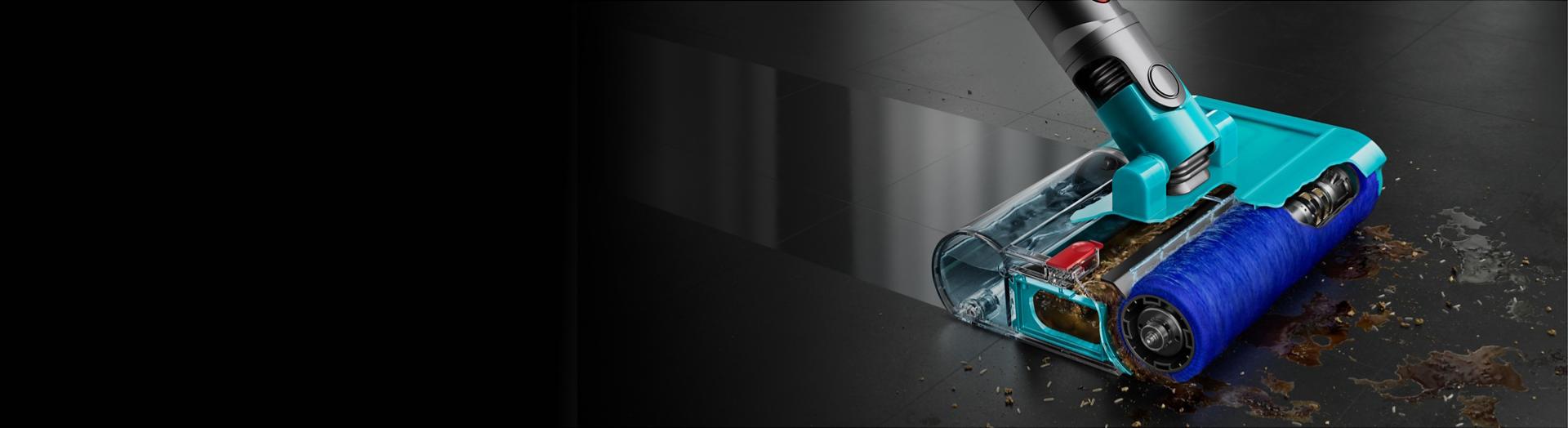 The Dyson V15s Detect Submarine cleans a spill off of a hard floor.