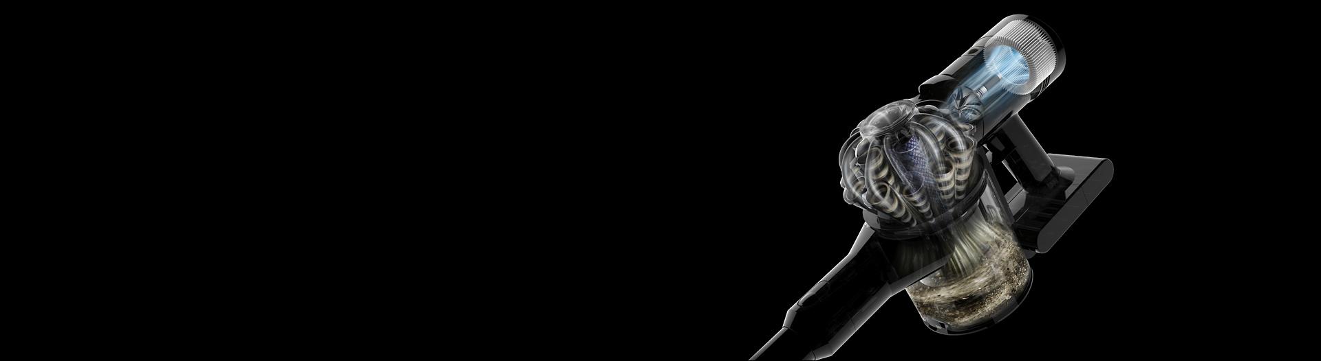 Close-up cutaway showing the filtration system inside the Dyson V8 vacuum.