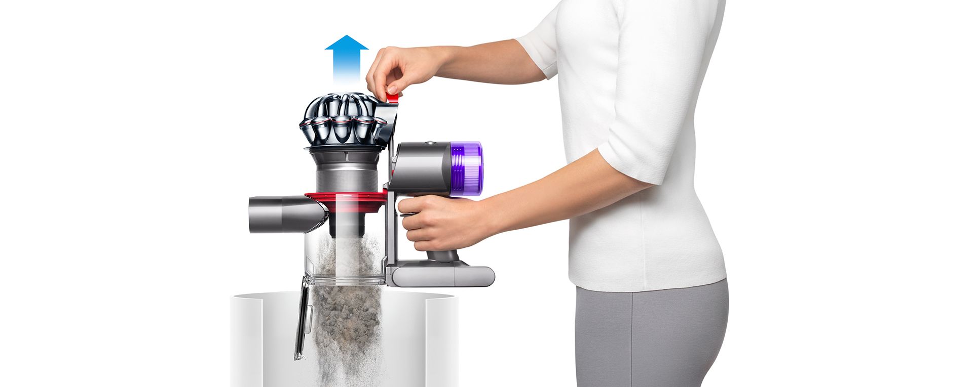 The Dyson V8 vacuum being emptied in a bin.