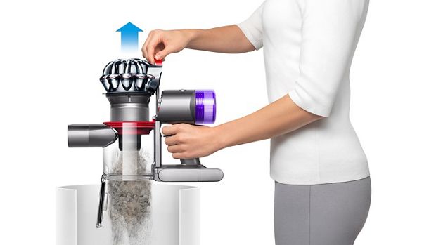 The Dyson V8 vacuum being emptied in a bin.